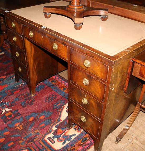 A nine drawer writing desk W.114cm